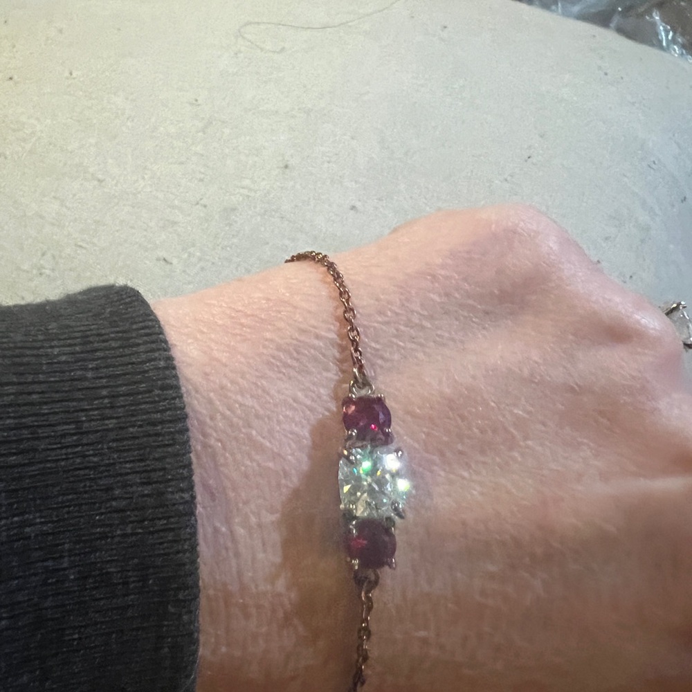 2.05 Ct Diamond Bracelet with a 1/2 Ct Simulated Ruby on each side of diamond